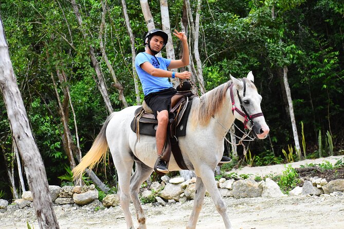 4 activities in 1 Horse Riding, ATV Shared, Cenote & Ziplines from Cancún - Shared ATVs on an obstacle-filled trail