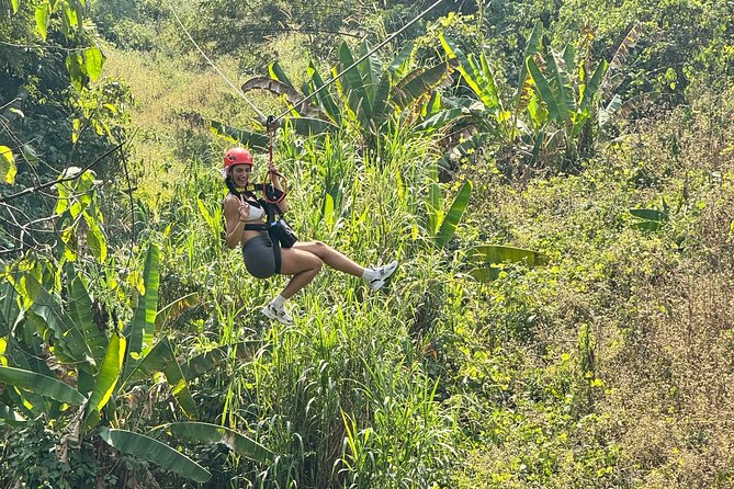 7 Hour Sticky Waterfall and Zipline Adventure - Climbing the strange, grippy rock at Bua Thong Falls
