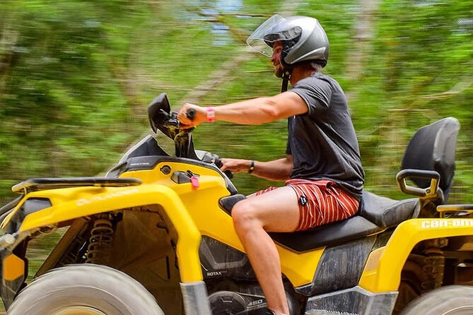 Adrenaline Tour from Cancún, ATV, Zipline, Cenote and Lunch - Ziplining from one-kilometer runs to water