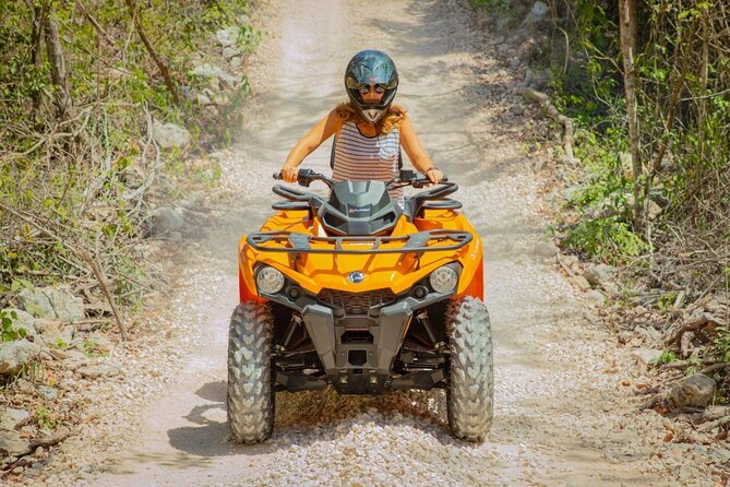 Adrenaline Tour with ATV, Zipline, and Cenote from Cancun - Riding ATVs on the Puerto Morelos jungle trails