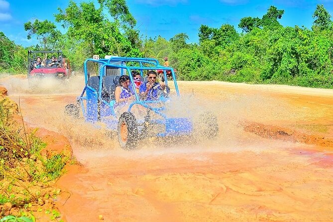 Adventure Tour con Buggies Ziplining Cenote y Taino Culture - Cooling off at Cenote Indigena Las Ondas