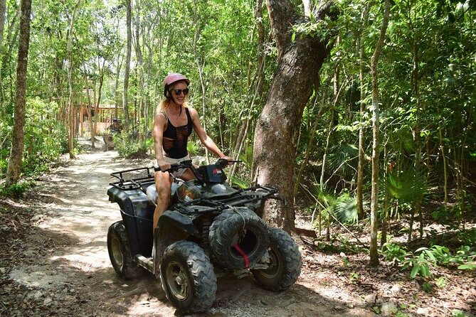 Amazing ATV (single) Cenote and Ziplines with Transfer from Playa del Carmen - A single ATV on a controlled jungle trail