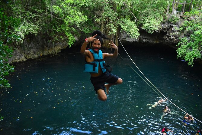 Amazing ATV Tour, Ziplines and Cenote Swim with Lunch and round trip included - Swimming in a Mayan Cenote