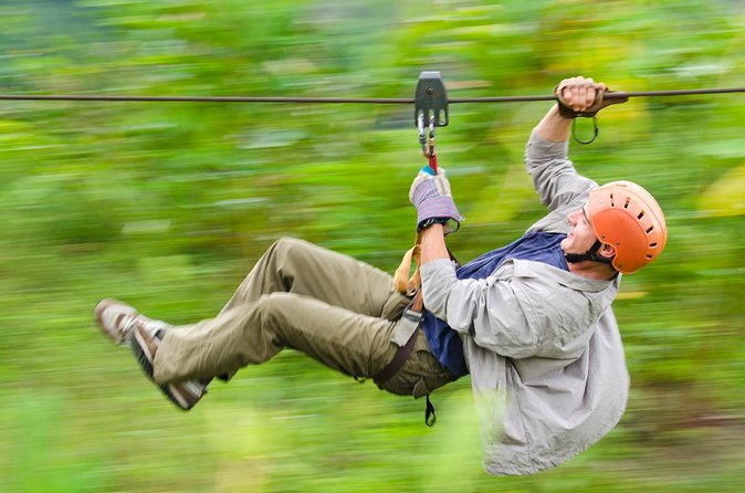 Arenal Volcano Combination Tour: Zipline, Tubing and Hot Springs - Nine zip lines through the forest