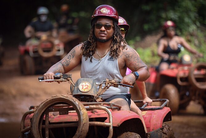 ATV adventure with cenote, ziplines, snack and transport from Cancun or Riviera - ATV riding through the jungle circuit