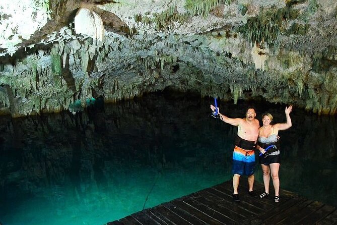 ATV Cenote and Zipline Adventure from Tulum - Entering the semi-dry cenote