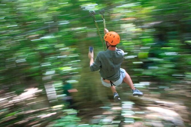 ATV Cenote and Zipline Sacred Jungle Expedition - Cooling off inside the cenote