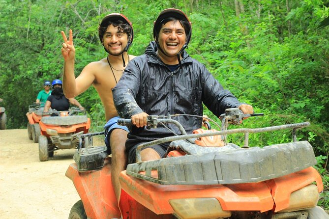 ATV Tour from Cancun and Puerto Morelos with Ziplines and Cenote. - ATV riding through the jungle
