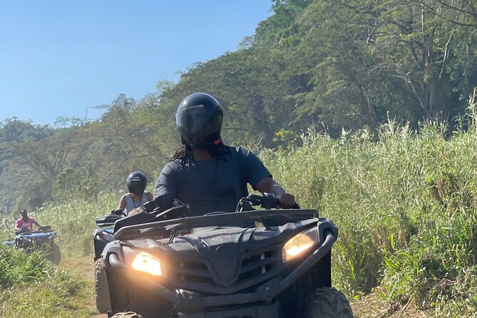 ATV, Zipline, Horseback, Bamboo Rafting and Rick’s Cafe - ATV riding through muddy Jamaican trails