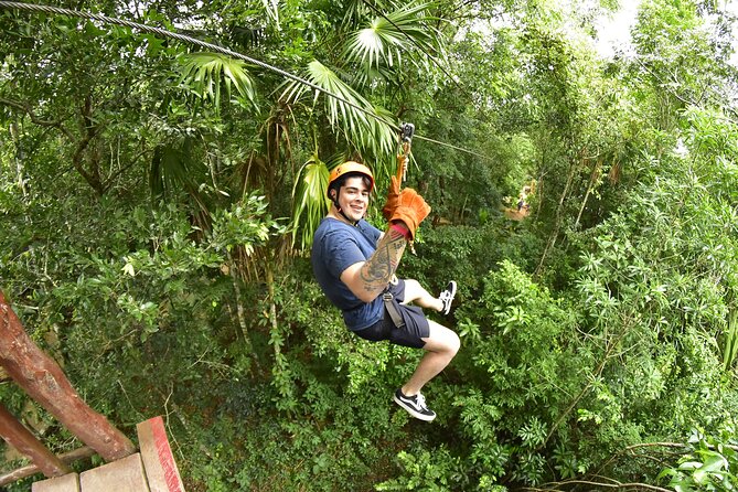 Awesome ATV experience in the jungle with cenote swim and ziplines included - Swimming in the sacred cenote