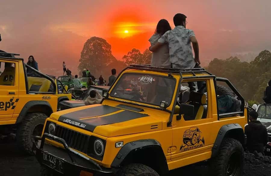 Bali: Mount Batur Jeep Sunrise Tour & Ubud Zipline Adventure - Riding across Mount Batur’s black lava fields