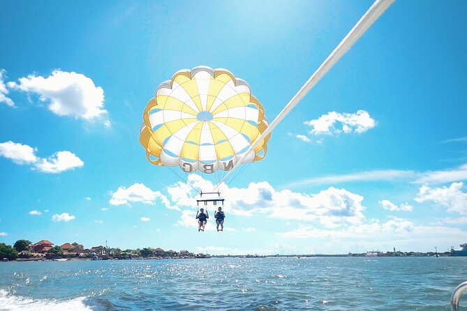 Bali: Zipline + Watersport Trio (Jetski, Parasailing, BananaBoat) - Banana boat fun for families and friends