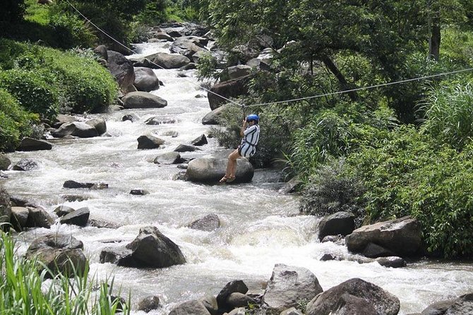 Bamboo Rafting, ATV Riding and Zip Line Tour From Phuket - Thai lunch, fruit, and a welcome pause