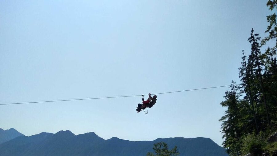 Bovec: Panoramic Zipline Tour - How the group moves from wire to wire
