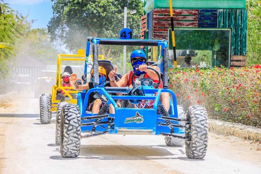 Buggy Ride, Zipline Splash & Waterfall Pool Combo with Lunch - Swimming in the blue cenote