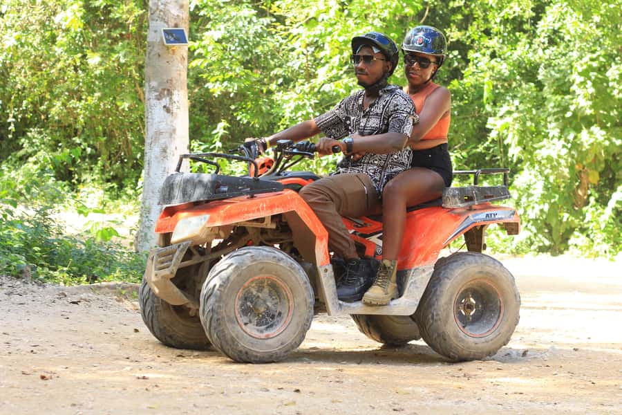 Cancún: ATV, Zipline, and Cenote Adventure with Lunch - Ziplining above the tree canopy