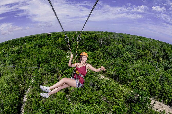 Cancun Cenote Tour: Snorkeling, Rappelling and Ziplining - The rappel into Yaxmuul adds a quick burst of nerve