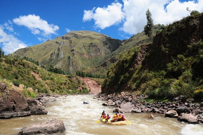 Cusco Rafting and Zipline Adventure - Gearing up beside the Vilcanota River