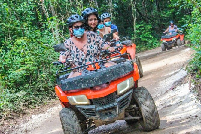 Drive an Atv shared, swim in a Cenote and ziplines in the Cancun - The cenote is the most memorable pause