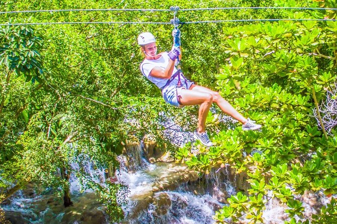 Dunn's River Falls and Park Tour with Zip Line from Montego Bay - Climbing the waterfall, one pool at a time