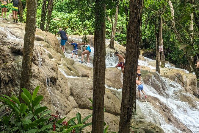 Dunns River Falls, Rafting, Zipline & Horseback from Montego Bay - White River rafting and the important caveat