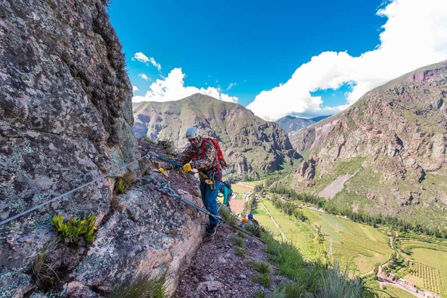 From Cusco: Via Ferrata & Zip Line with lunch - Climbing the rock wall on the Via Ferrata