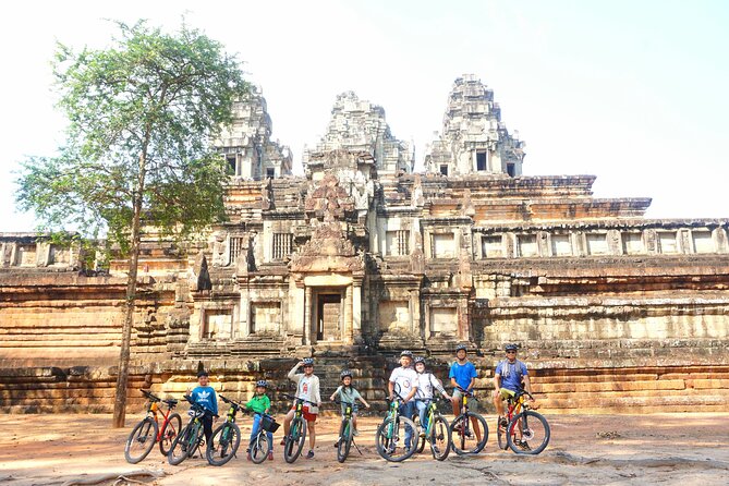 Full-Day Bike Tour in Siem Reap with Zipline - Changing from harness to bicycle