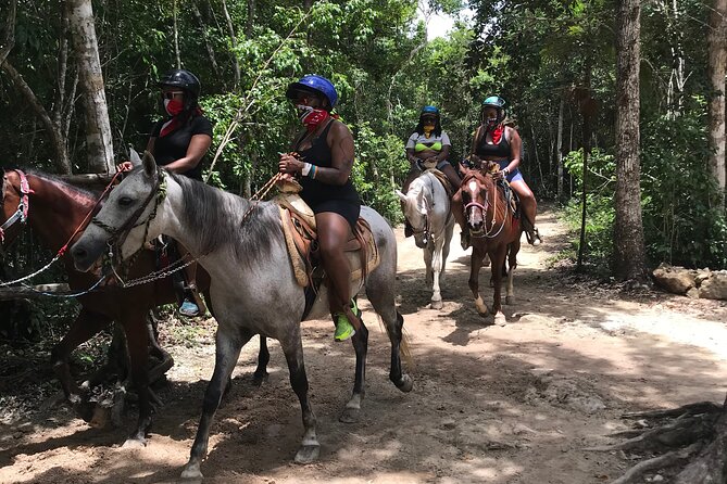 Horseback riding with ATV, zip lines and cenote, lunch and transfer - Zip lines above the trees