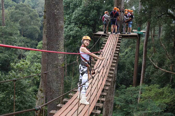 Jungle Flight Zipline Adventure From Chiang Mai - Getting fitted for the treetop course