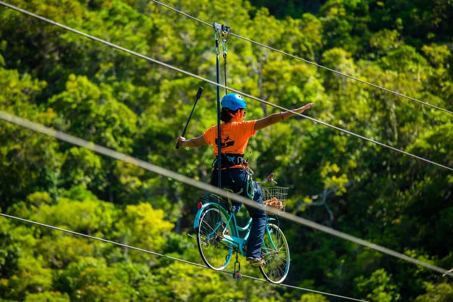 Ko Pha Ngan: Sky-High Zipline & Wang Sai Waterfall Views - Pedaling through the air on the Sky Bike