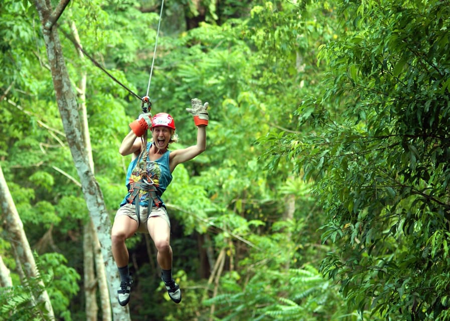 Krabi: Zipline, ATV & Top Rope Climbing Experience - Flying above the rainforest canopy