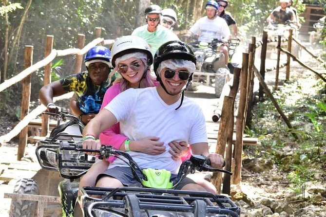 Playa del Carmen Jungle Adventure ATV Zipline and Cenote - ATV riding on muddy jungle trails