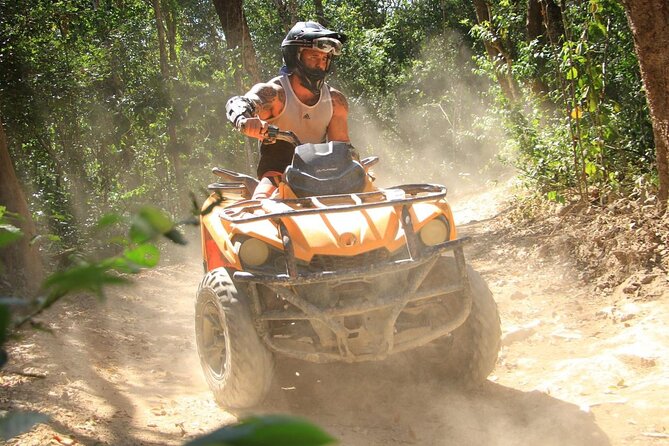 Playa del Carmen Maya Adrenaline Day ATV Zipline and Cenote - Cooling off in an artificial cenote