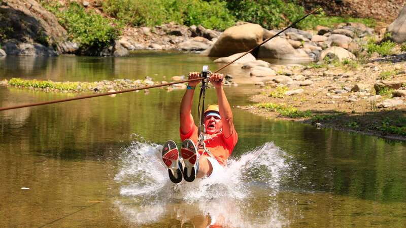 Puerto Vallarta: Canopy River Zip Line Tour with Mule Ride - Crossing the Jorullo Bridge