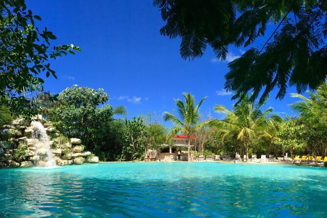 Punta Cana Ziplines, Hanging Bridge, and Waterfall Pool Adventure - A Dominican village and a plate of local comfort food