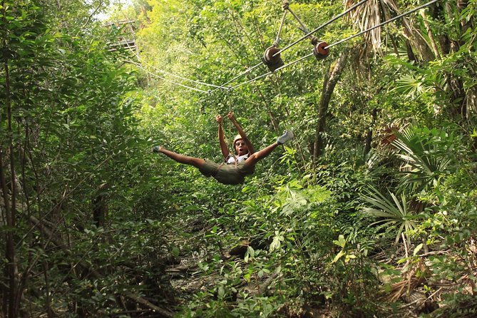 Riviera Maya Jungle Half-Day Tour: ATV, Ziplines, Cenote Swim, Rappel - ATV riding on dirt roads and jungle tracks