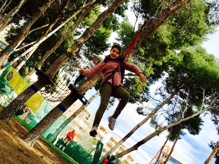 Salou: Bosc Aventura Salou Zip Lining Experience - The blue level builds confidence step by step