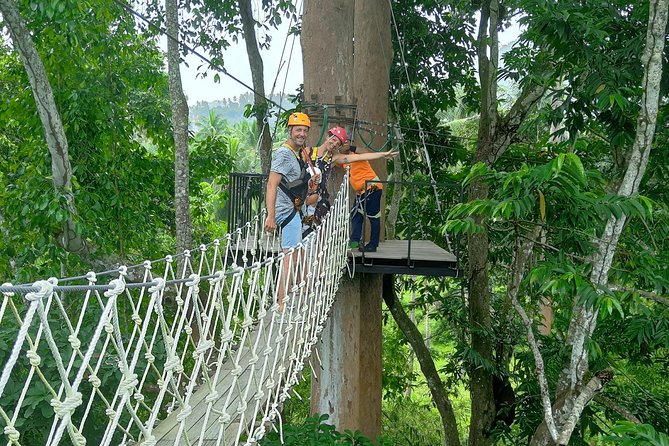 Samui Zipline Explore and Connect with Nature - Climbing through the treetops