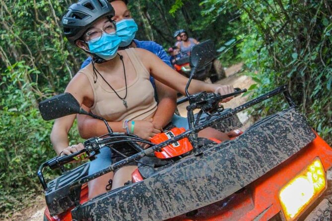 Shared ATV's and Zip Lines and Swimming in a Real Cenote. - Shared ATVs through the park