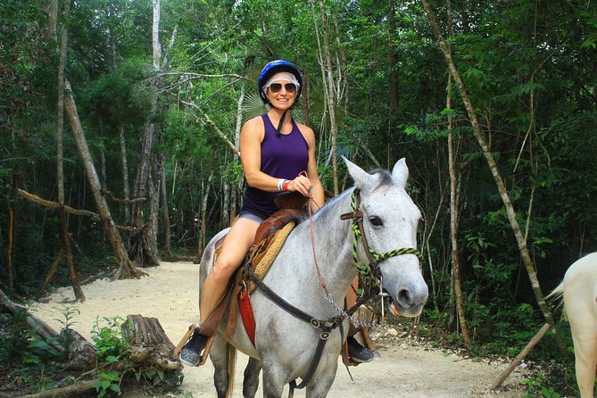 Single ATV, Horseback Riding, Ziplines and Cenote Swim - Cooling off in an authentic Mayan cenote