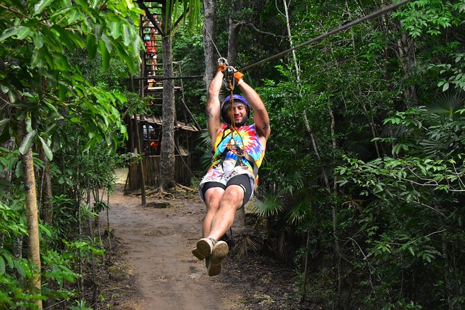Single ATV, Horseback Riding, Ziplines and Cenote Swim - Riding a single ATV through the jungle