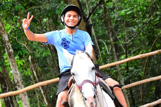 Single ATV, Ziplines, Cenote & Horse Riding from Cancun & Playa Del Carmen - Zipline views above the trees