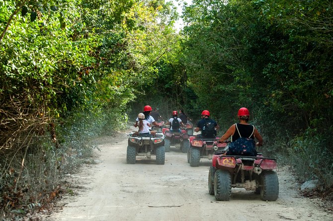 The best ATVs, zipline, cenote tour with lunch and transportation - Hotel pickup and the long road from Cancun