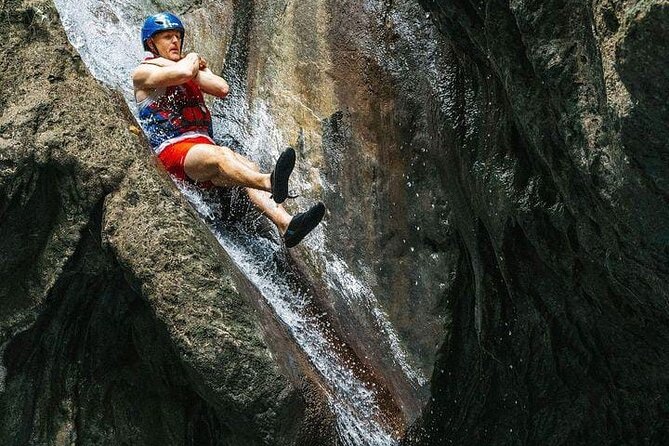 Triple Adventure Zipline Waterfalls & Buggy - Sliding and swimming at Damajagua River
