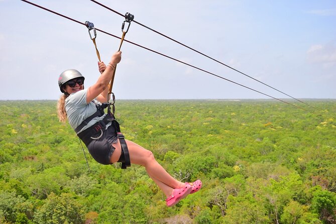 Tulum Adrenaline Tour ATV Ziplines and Cenote Swim Day - Swimming in an Underground Cenote
