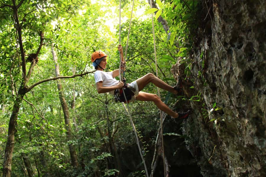 Tulum: ATV, Cenote, Zip lining and Rappelling Experience - A natural cenote with stalactites and wrist lights