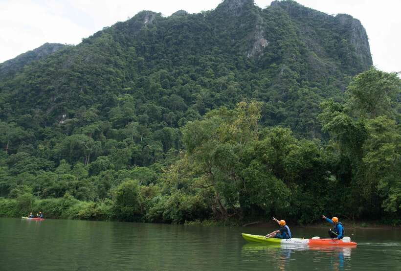 Vang Vieng: Kayaking & Cave Tubing with Zip Line/Blue Lagoon - Picnic lunch beside Phar None Cliff
