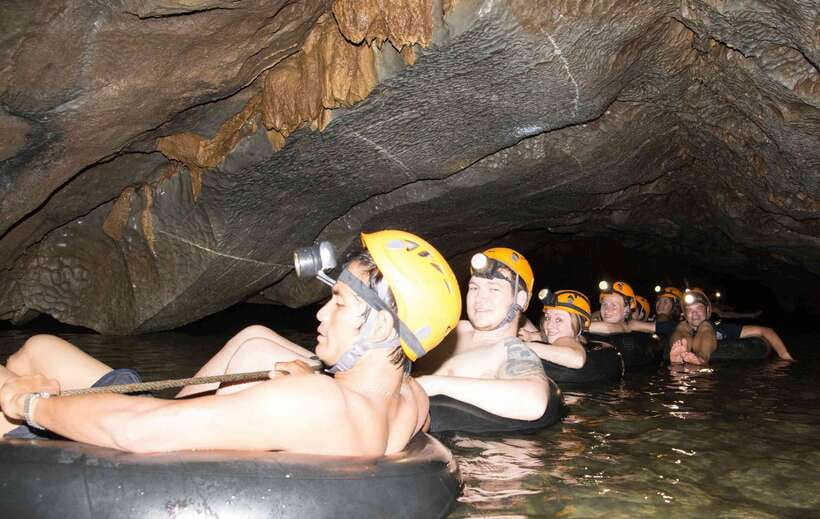 Vang Vieng: Kayaking & Cave Tubing with Zip Line/Blue Lagoon - Ziplining through the trees