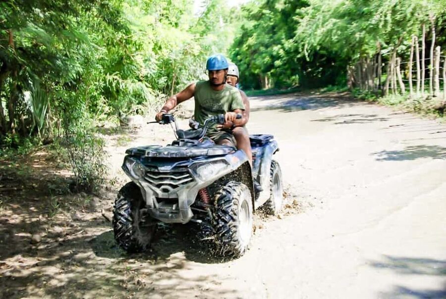 VIP DayPass | ATV's, Zip Lines, Horse Riding| Hotel & Cruise - ATV driving through a riverbed and village roads