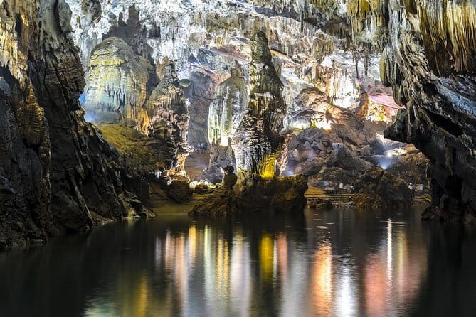 Zipline Dark cave & Paradise cave: Full-day Exploration - Dark Cave begins with a water-landing zipline